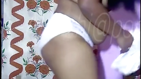 A hot brunette with nice big tits fucks herself on cam