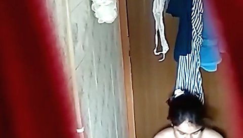 Hot sexy brunette naked in a wet towel in a hidden cam