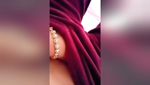Indian girl is playing her sex toy on her bed in bed