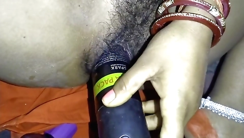 Hairy brunette pussy gets face painted in a fetish porn video