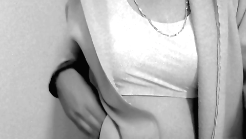 Indian girl is filmed in a solo video with a nice dress