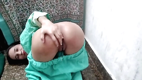 Sexy indian babe in her red dress and black ponytail