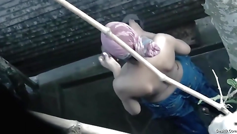 Indian naked girl with shaved pussy bathing and a towel