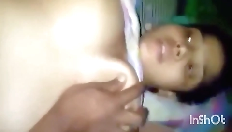 Indian girl in a white dress and t-shirt plays with her boyfriend