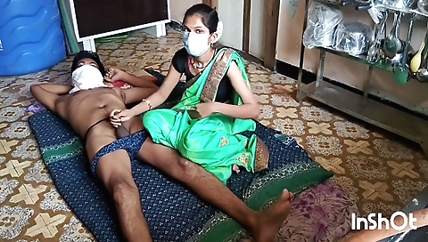 Indian girl in green shorts and a black bra is masturbating