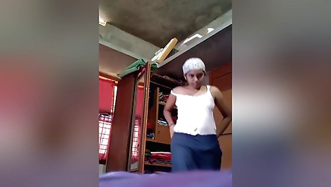 Indian beauty in her white lingerie showing her face