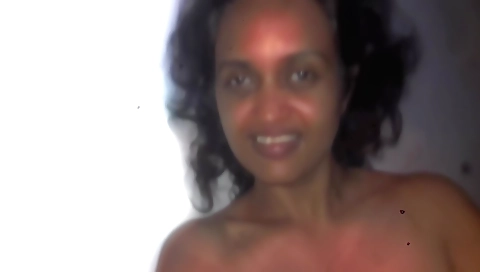 Indian solo amateur video with a brunette in red lingerie