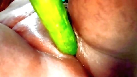 Indian wife gets her pussy drilled with a cucumber