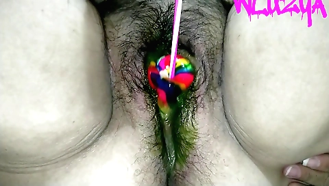 Hot Indian blonde fucks her hairy pussy with a candy lollipop