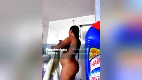 Indian woman in a bikini shows her sexy body in a solo clip