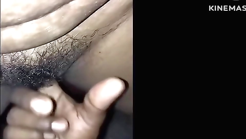 Indian girl is playing with her hairy pussy while doing actions