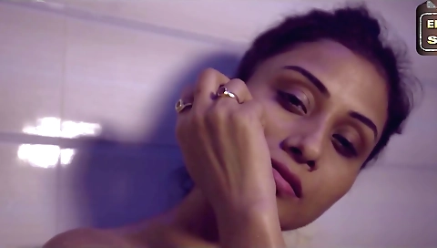 Sexy brunette in white stockings taking a deep breath