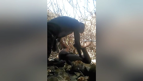 Indian chick outside the car in a bikini and jeans