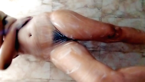 Indian beauty has her hairy pussy penetrated on the shower floor
