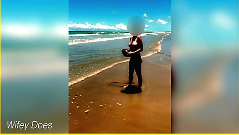 Sexy naked amateur with sexy dress riding football on beach